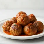 Delicious homemade meatballs with marinara sauce, perfect for a classic Italian dinner recipe.